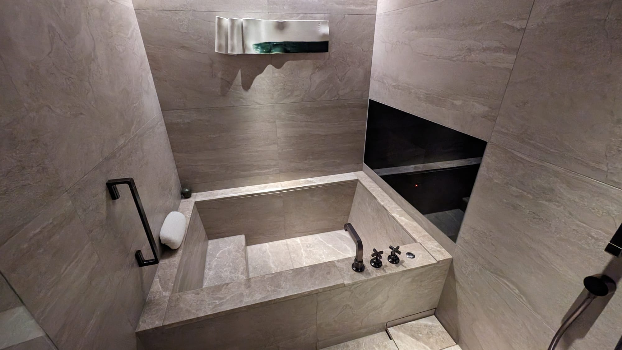 Photo of a Soaking tub and tv at the HOTEL THE MITSUI KYOTO, a Luxury Collection Hotel & Spa