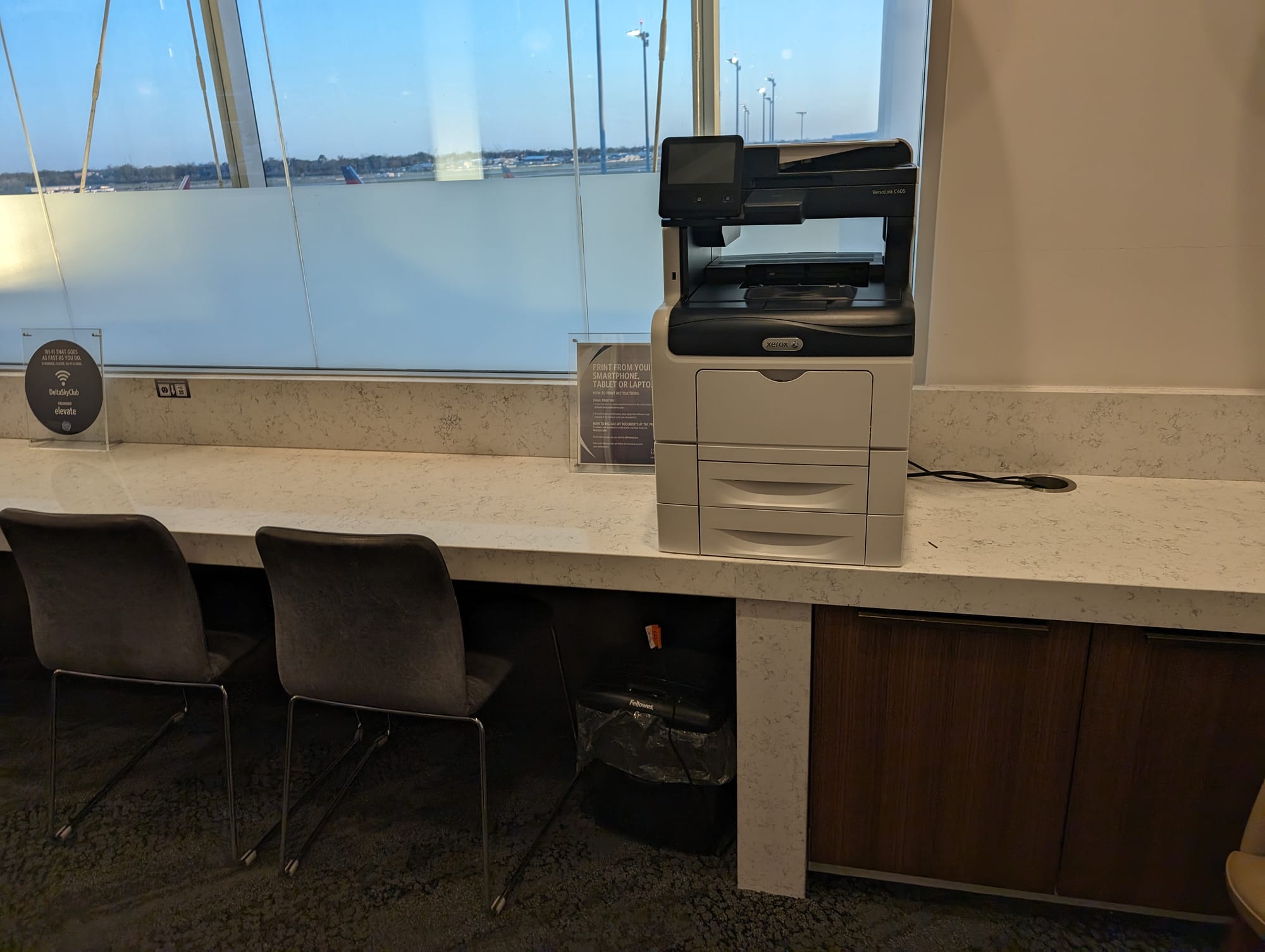 Delta Club MSY printer/fax - Source: You Are Travel