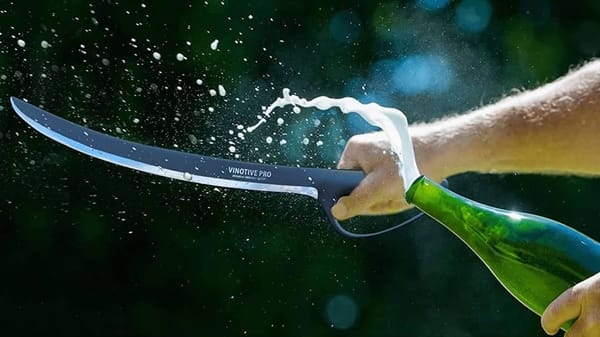 Photo of sabering a champagne bottle