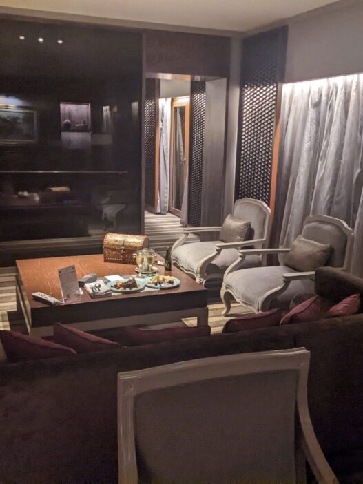 a room with a table and chairs