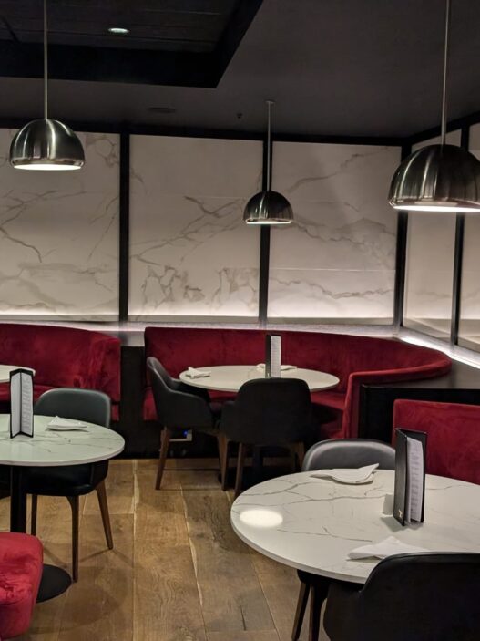 a room with tables and chairs