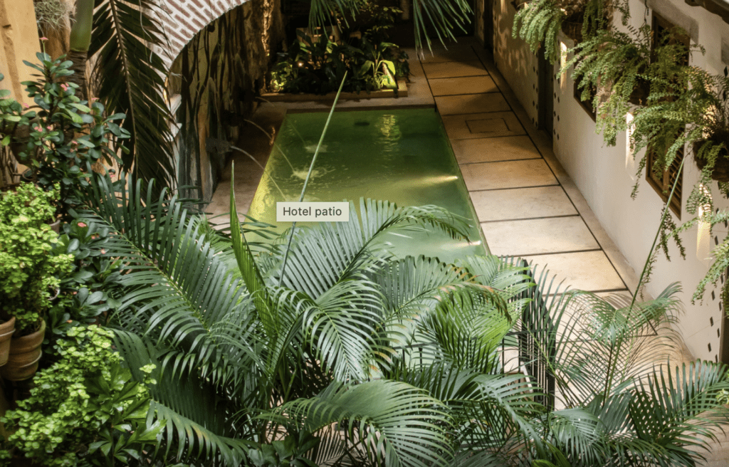 a pool with a sign in the middle of a building