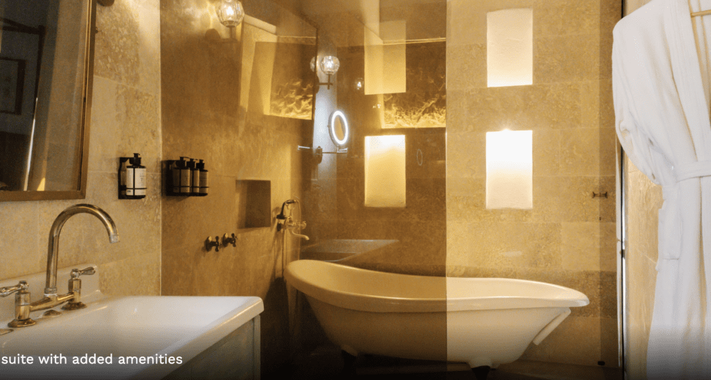 a bathroom with a tub and a sink