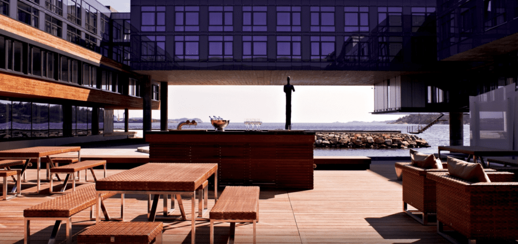 a patio with a table and chairs