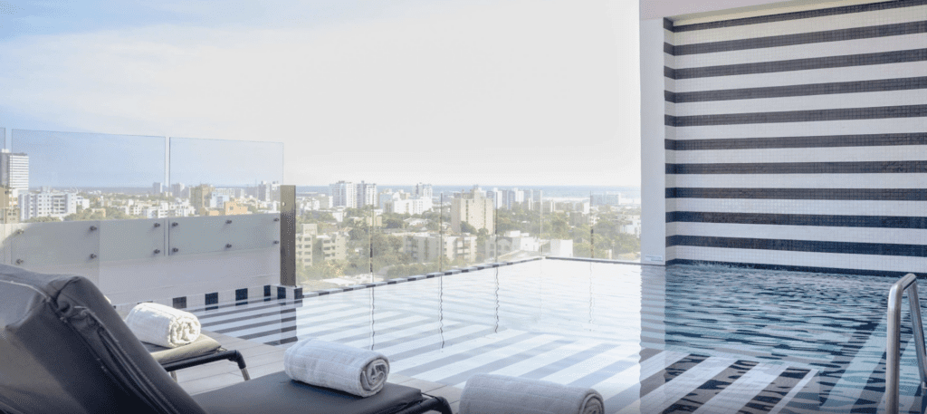 a pool with a view of a city
