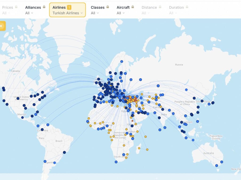 a map of the world with blue and yellow dots