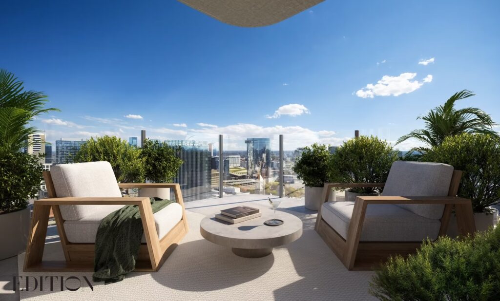 a patio with chairs and a table