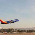 a Southwest plane flying in the sky